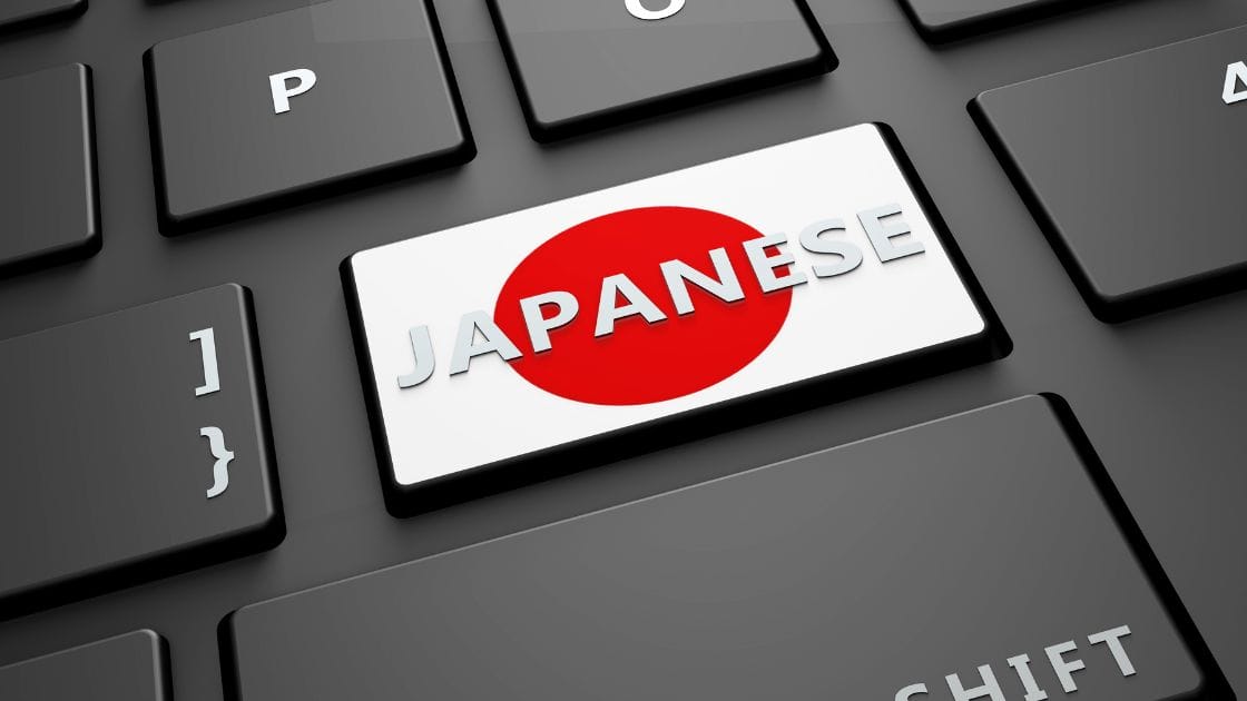 Japanese flag on a computer keyboard.